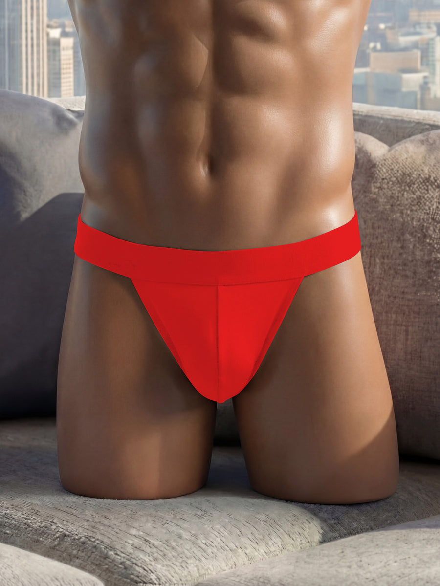 Men's black solid color jockstrap featuring a cut-out back design, tape detailing, and mid-rise waist crafted from medium-stretch knitted fabric.