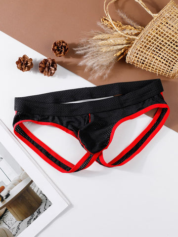 Black low rise men's contrast color thong with V neck and Christmas pattern design.