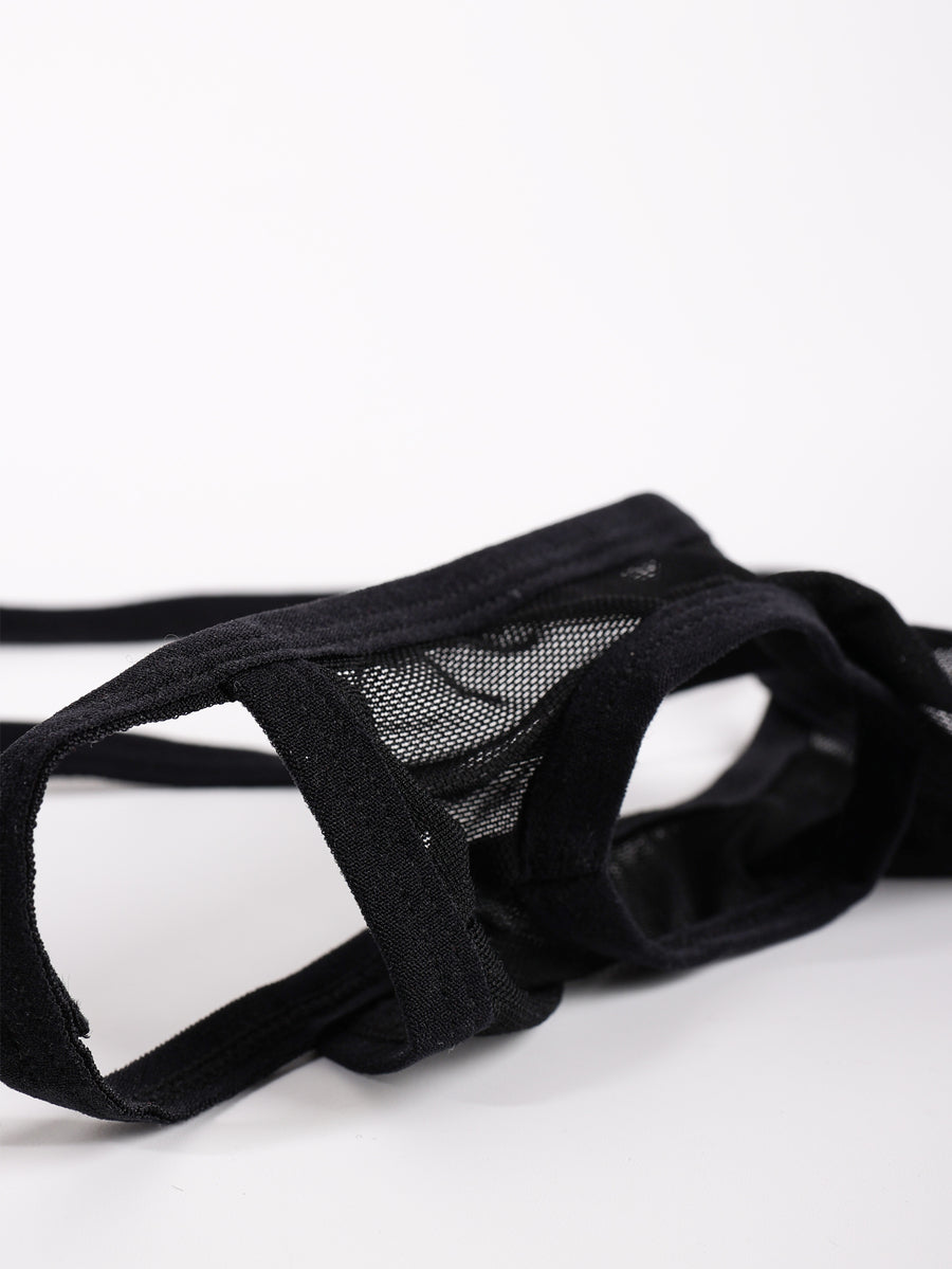 Black men's low rise mesh thong underwear with U-convex pouch.