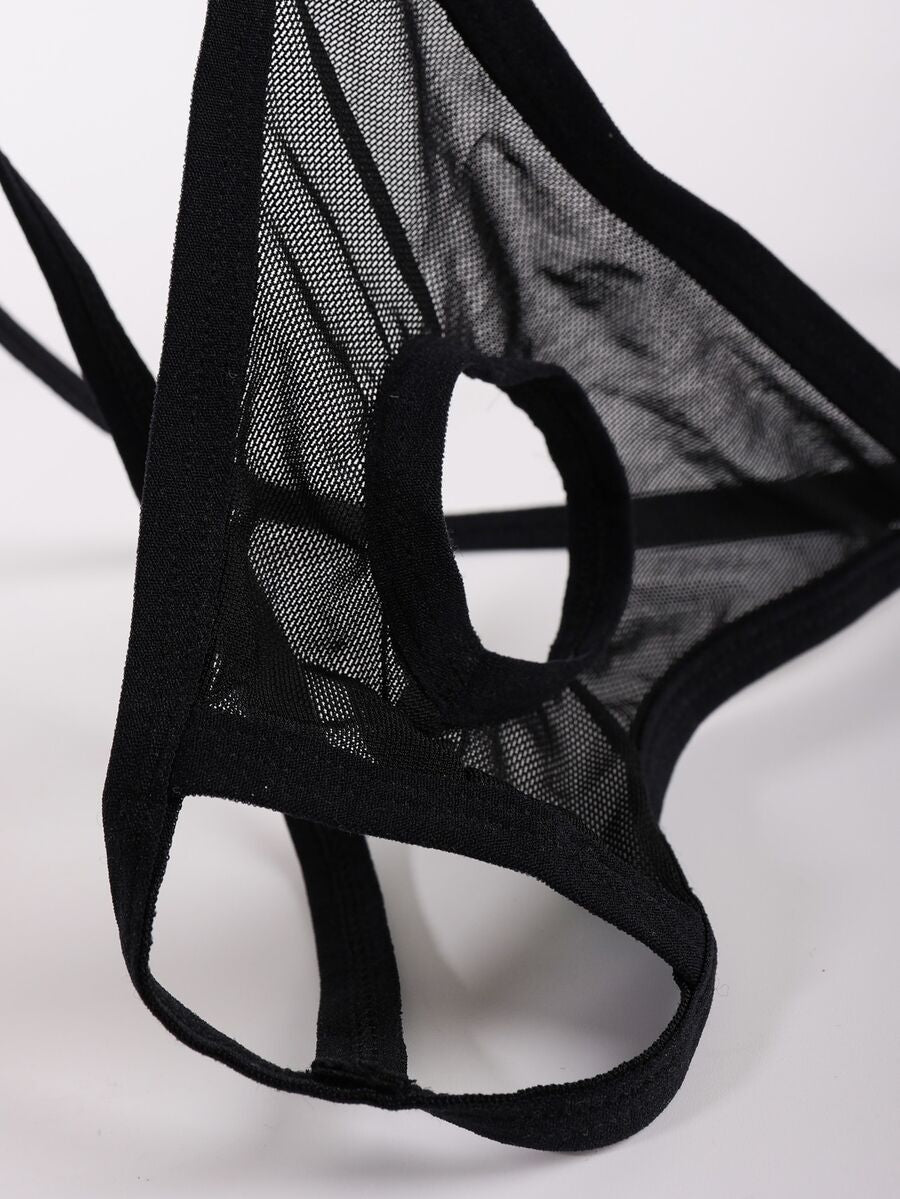 Black men's low rise mesh thong underwear with U-convex pouch.