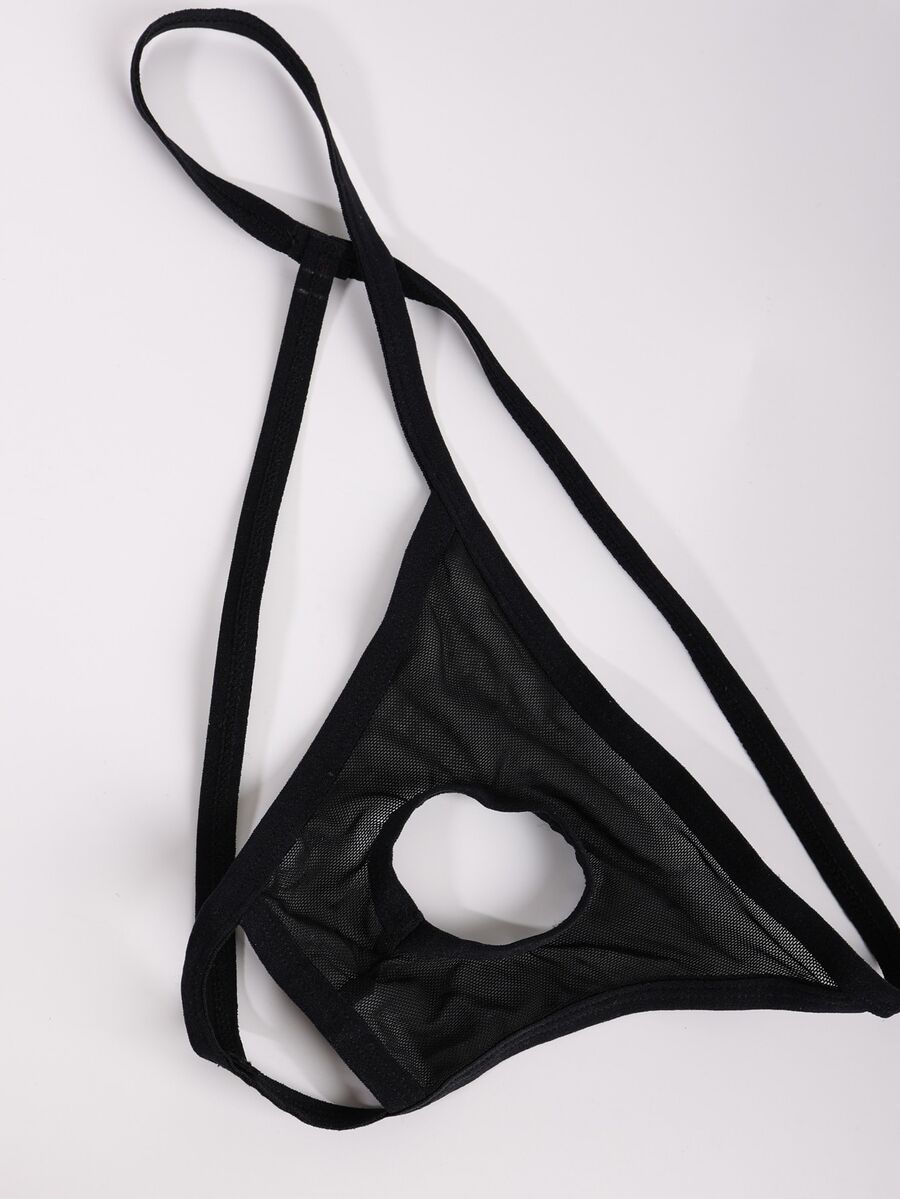 Black men's low rise mesh thong underwear with U-convex pouch.