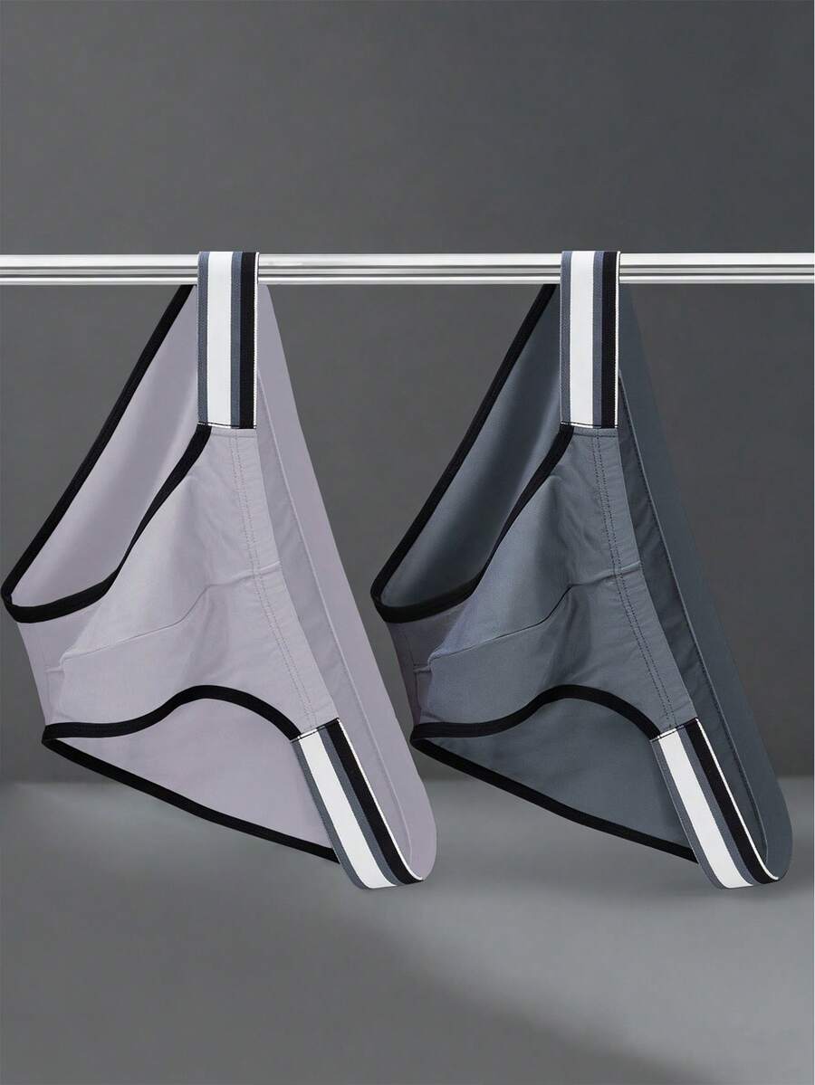 3-pack set of men's high-cut briefs featuring colorblock and plaid patterns with a striped waistband and mid-rise fit.