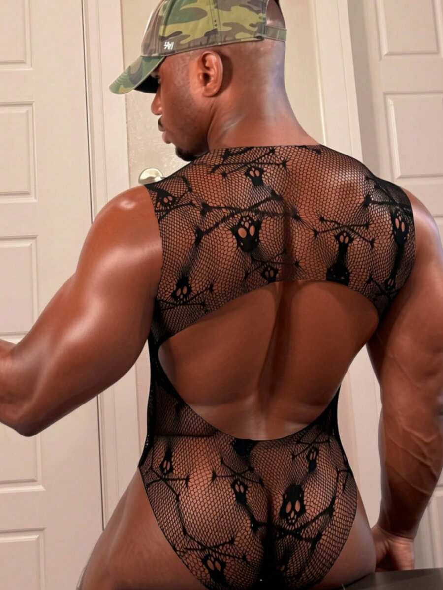 Black long one-piece bodysuit for men featuring hollow out design, round neck, and high stretch knitted fabric.