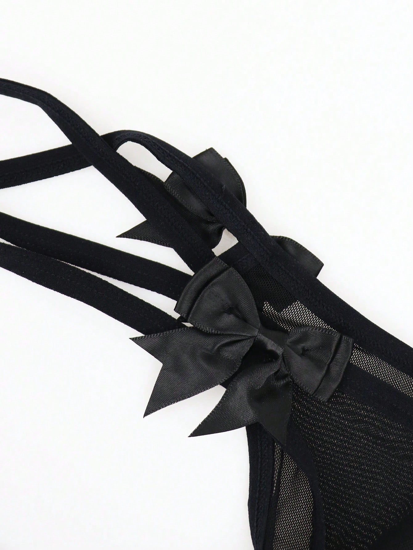 Men’s Black Mesh Shorts With Bow Accent And Cutout Design