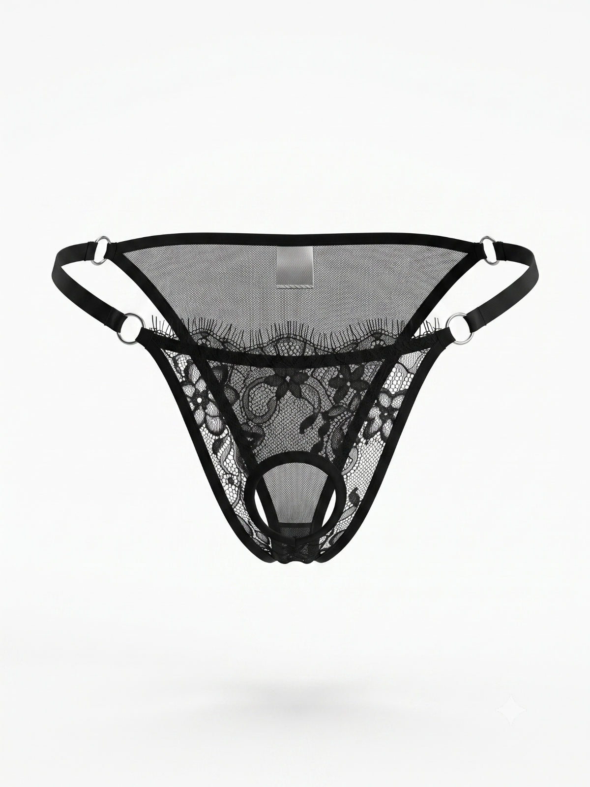 Men's black lace low rise thong featuring sheer plant pattern fabric and metal decor.