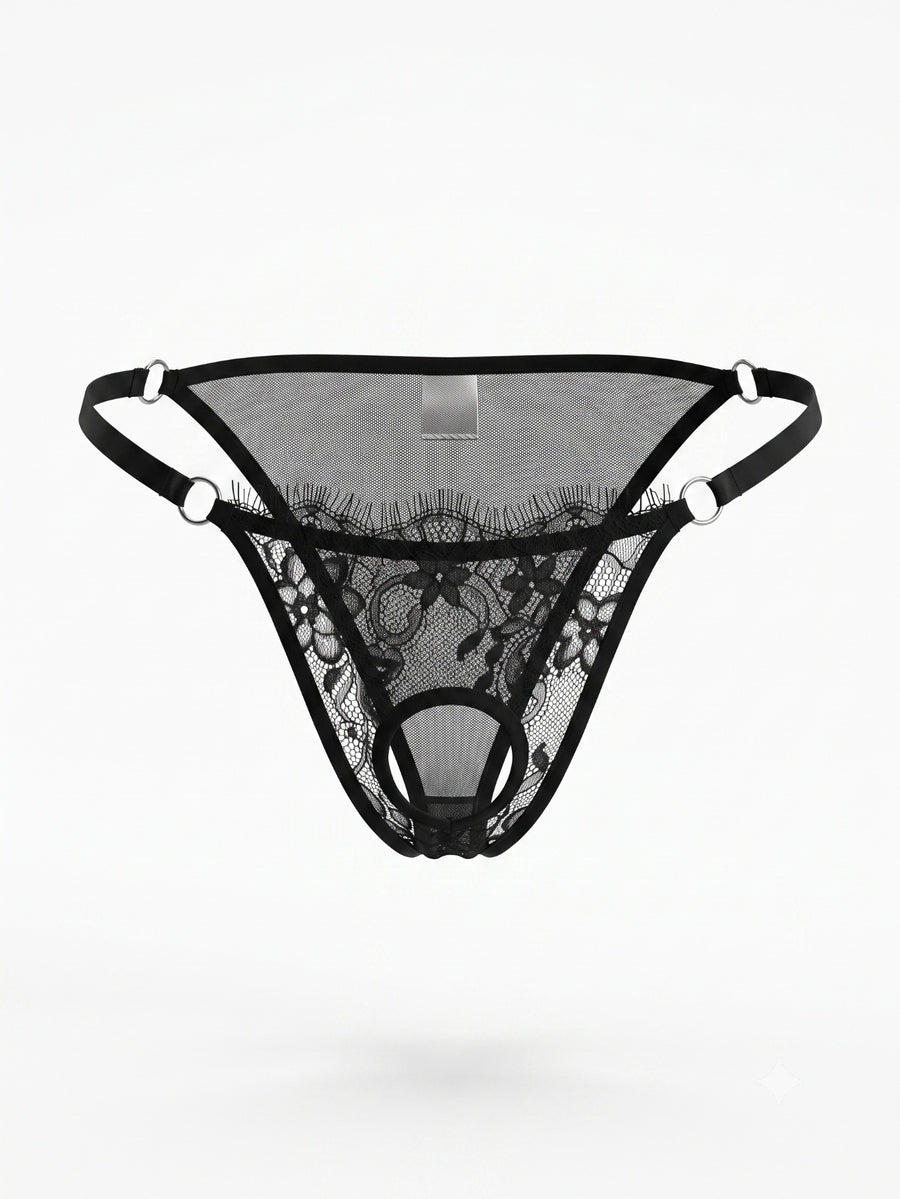 Men's black lace low rise thong featuring sheer plant pattern fabric and metal decor.